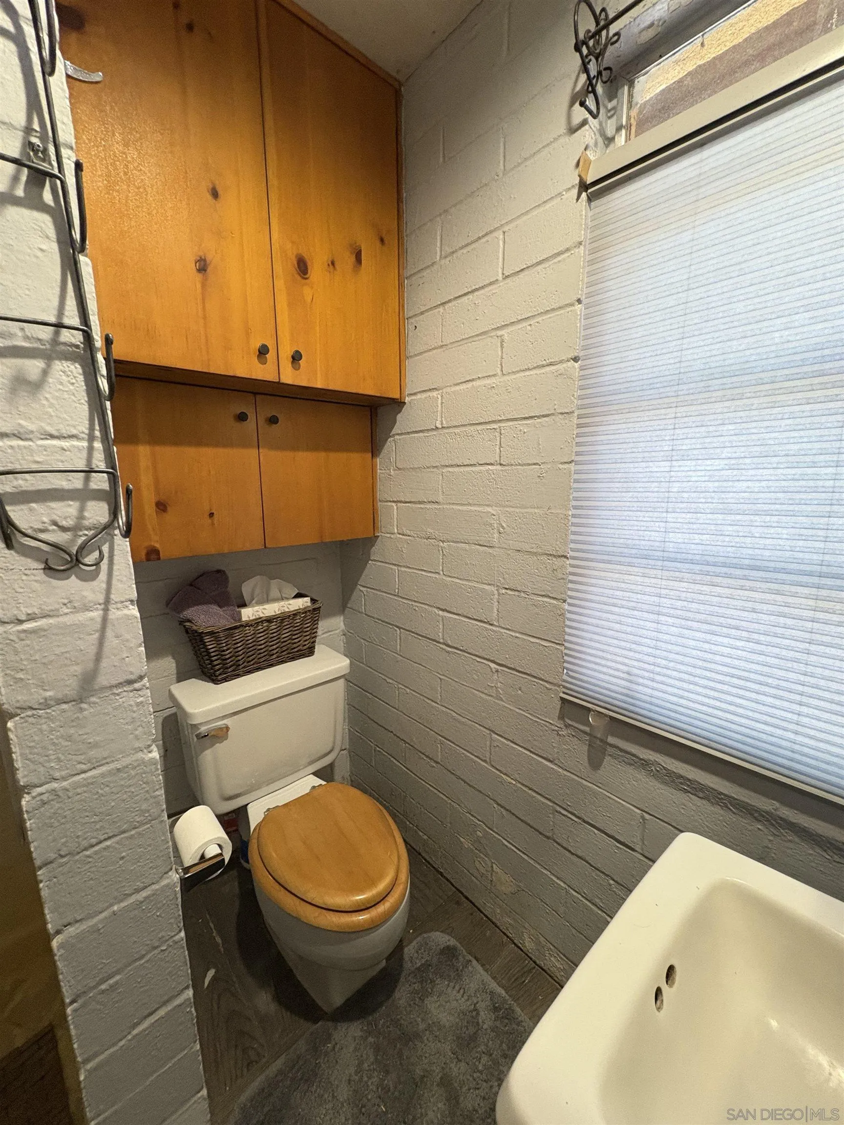 22188 Crestline Road Palomar Mountain, CA 92060 - Photo 40 of 69 a bathroom with a sink a toilet and shower