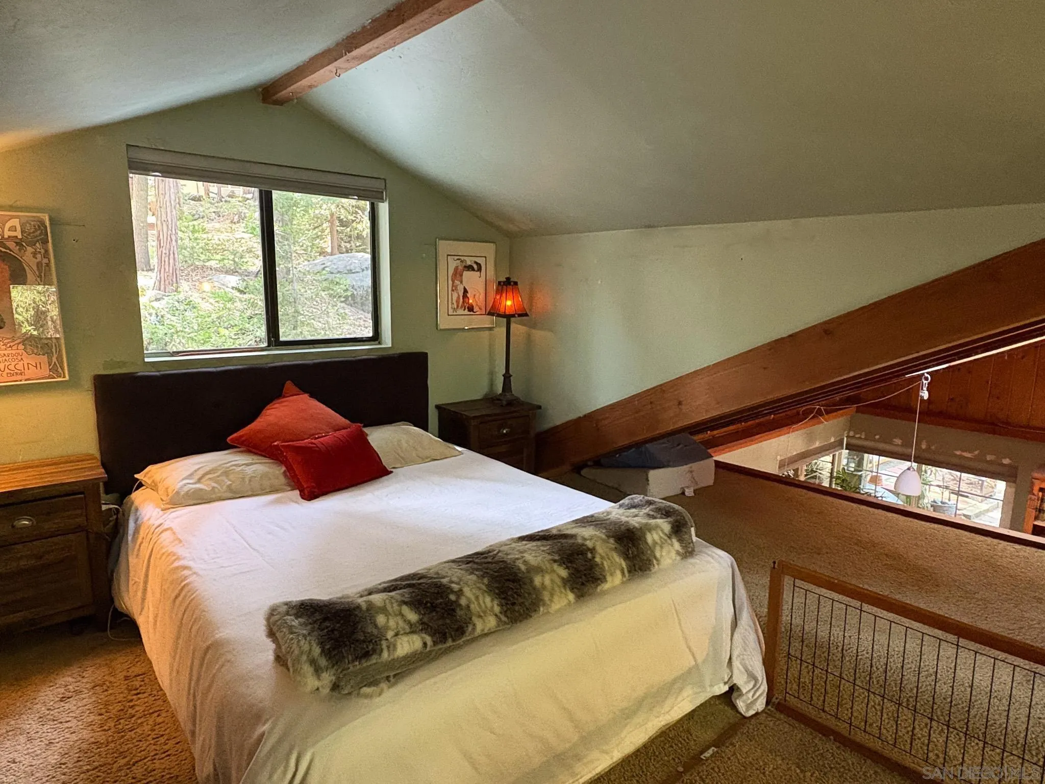 22188 Crestline Road Palomar Mountain, CA 92060 - Photo 43 of 69 a bedroom with a bed and a window