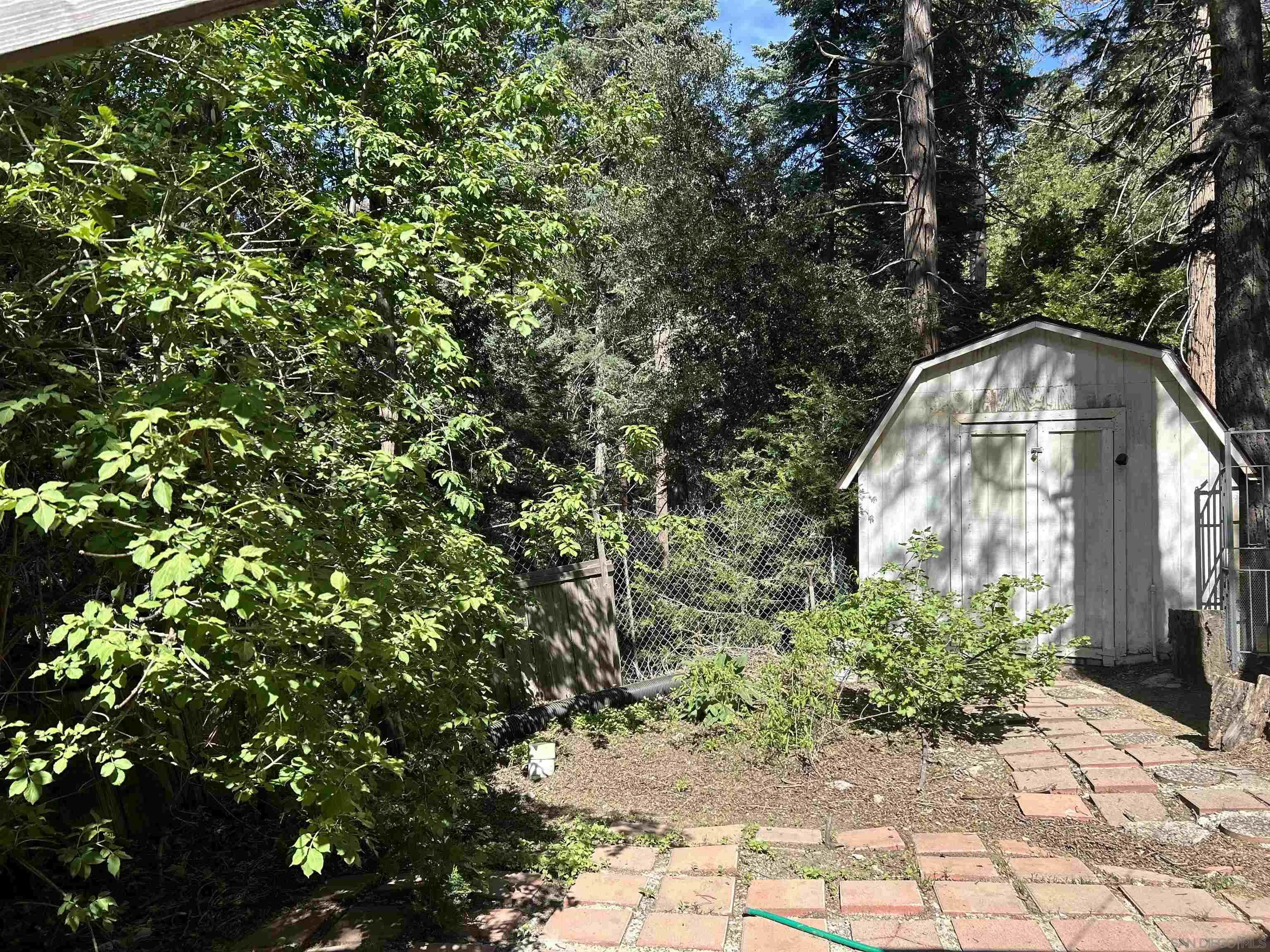 22188 Crestline Road Palomar Mountain, CA 92060 - Photo 66 of 69 a view of a house with a tree