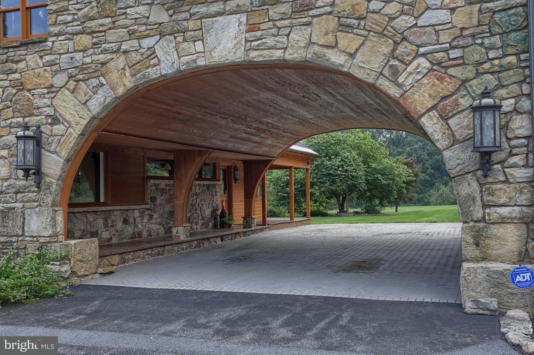 693 Burnt House Road Carlisle, PA 17015 - Photo 9 of 54 4 car carport with barrel cedar ceiling/ paver fl.