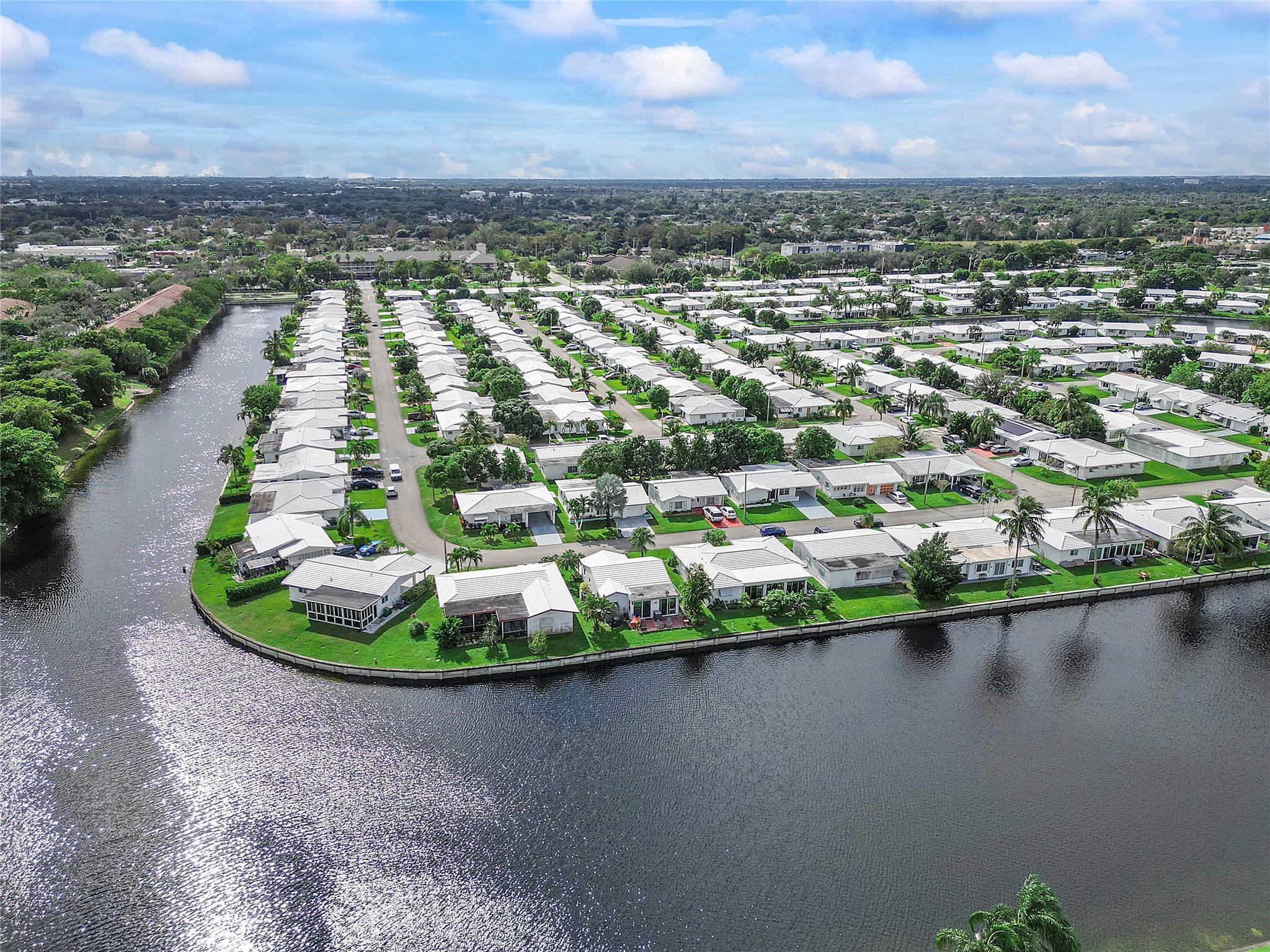 8103 Northwest 58th Place Tamarac, FL 33321 - Photo 19 of 19 a view of a lake with a city