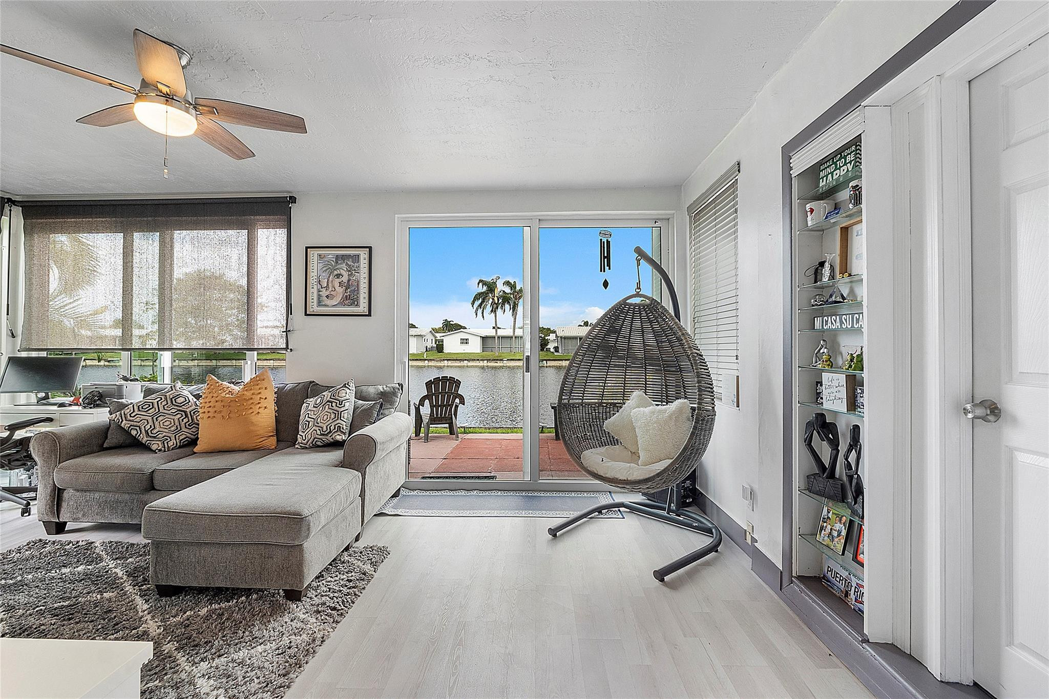 8103 Northwest 58th Place Tamarac, FL 33321 - Photo 2 of 19 a living room with furniture and a large window