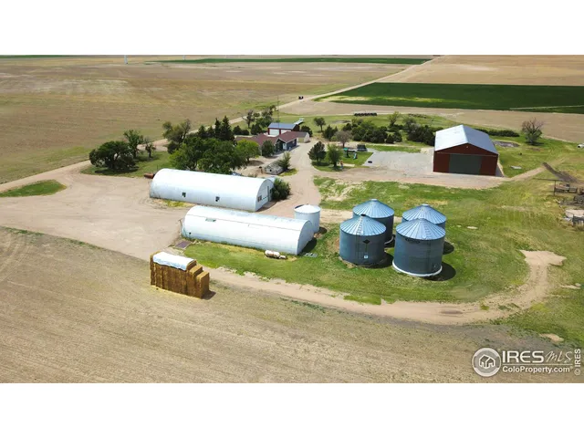 a black and white photo of a beach