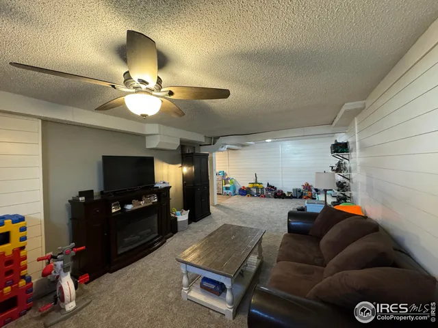 a view of a workspace with furniture