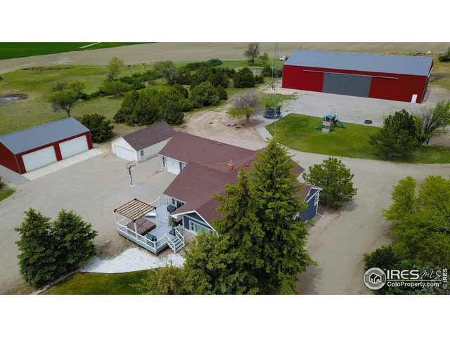 a balcony with a view of the house