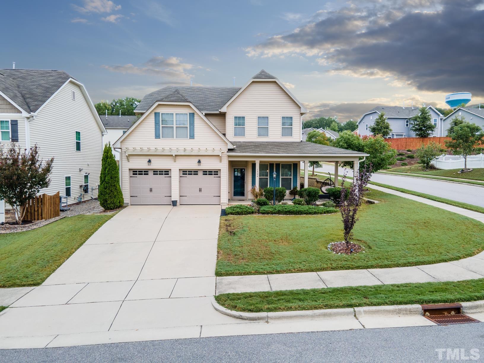 1304 Gaby Lane Knightdale, NC 27545 - Photo 1 of 27 a front view of a house with a yard