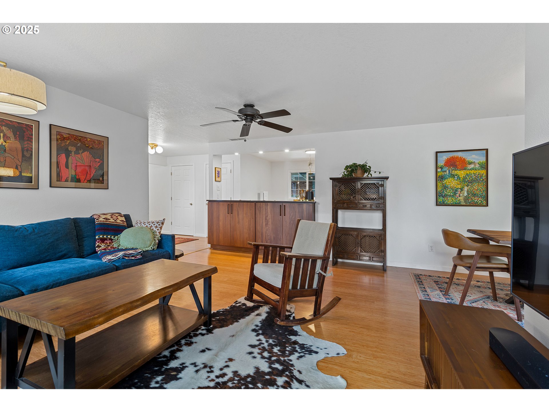 8405 Southwest Lori Way Beaverton, OR 97007 - Photo 12 of 48 a living room with furniture and wooden floor