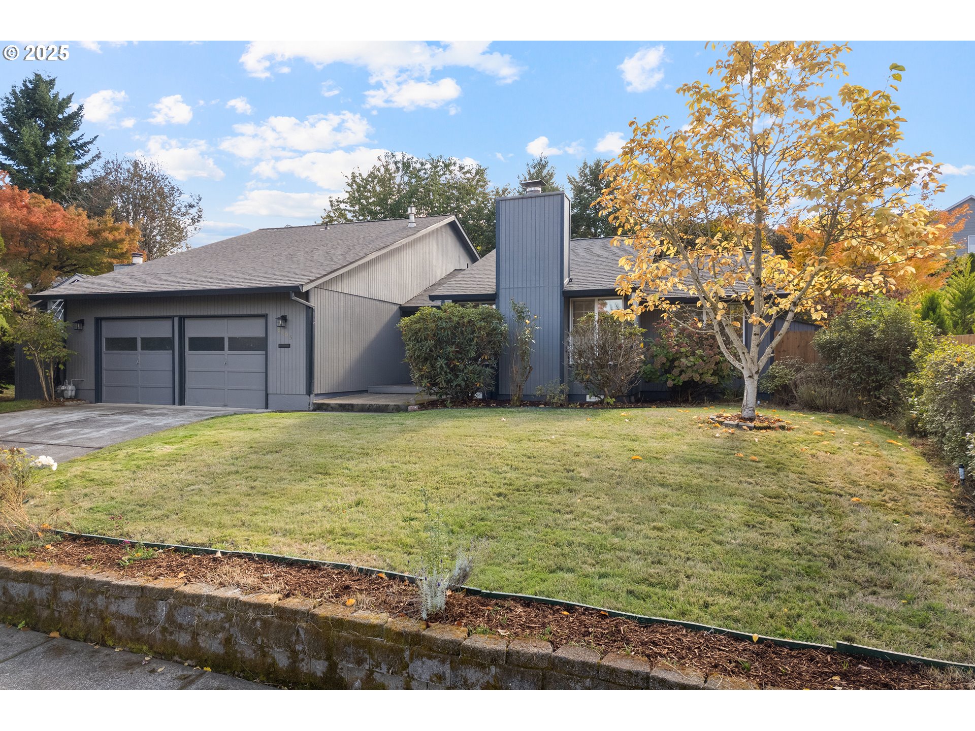 8405 Southwest Lori Way Beaverton, OR 97007 - Photo 2 of 48 a house view with swimming pool in front of it