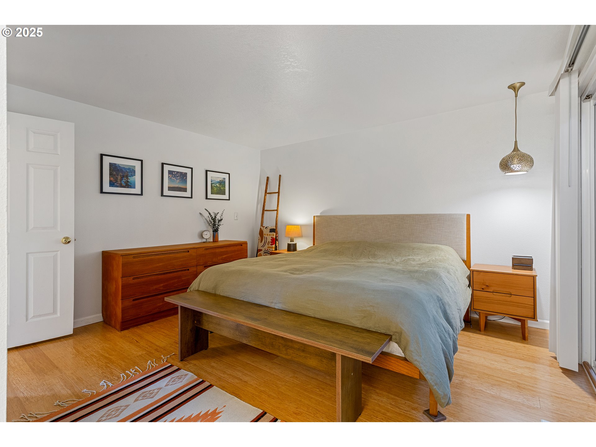 8405 Southwest Lori Way Beaverton, OR 97007 - Photo 26 of 48 a bedroom with a bed and a night stand