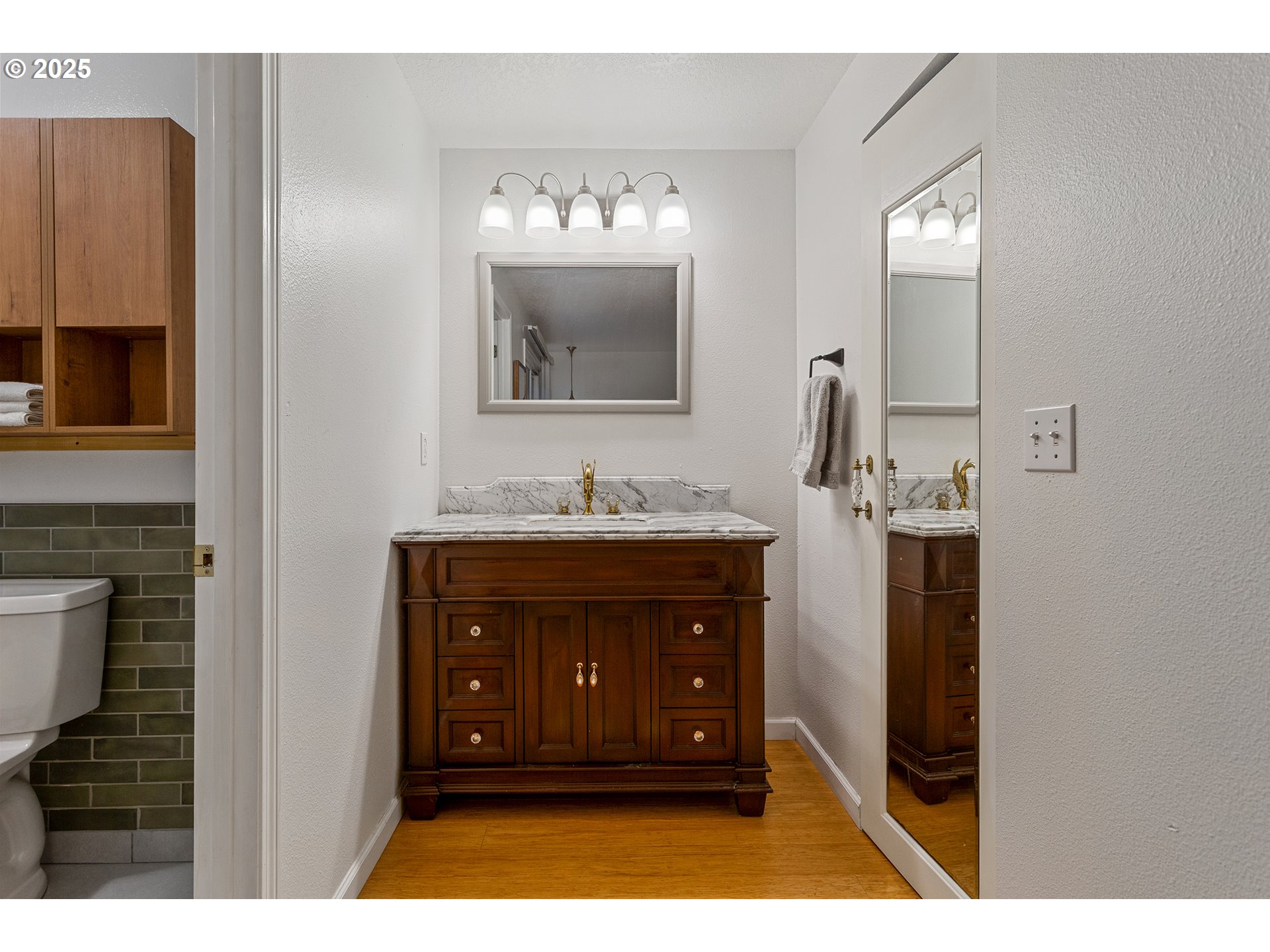 8405 Southwest Lori Way Beaverton, OR 97007 - Photo 27 of 48 a bathroom with a sink vanity and mirror