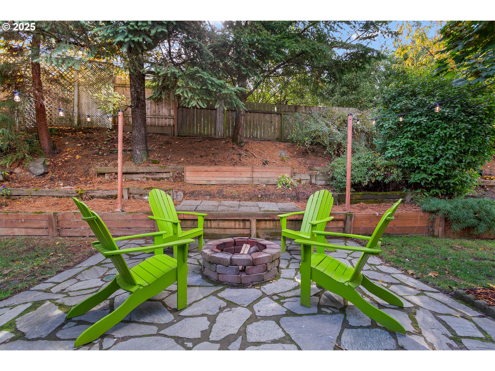 8405 Southwest Lori Way Beaverton, OR 97007 - Photo 40 of 48 a view of a chairs and table in the backyard