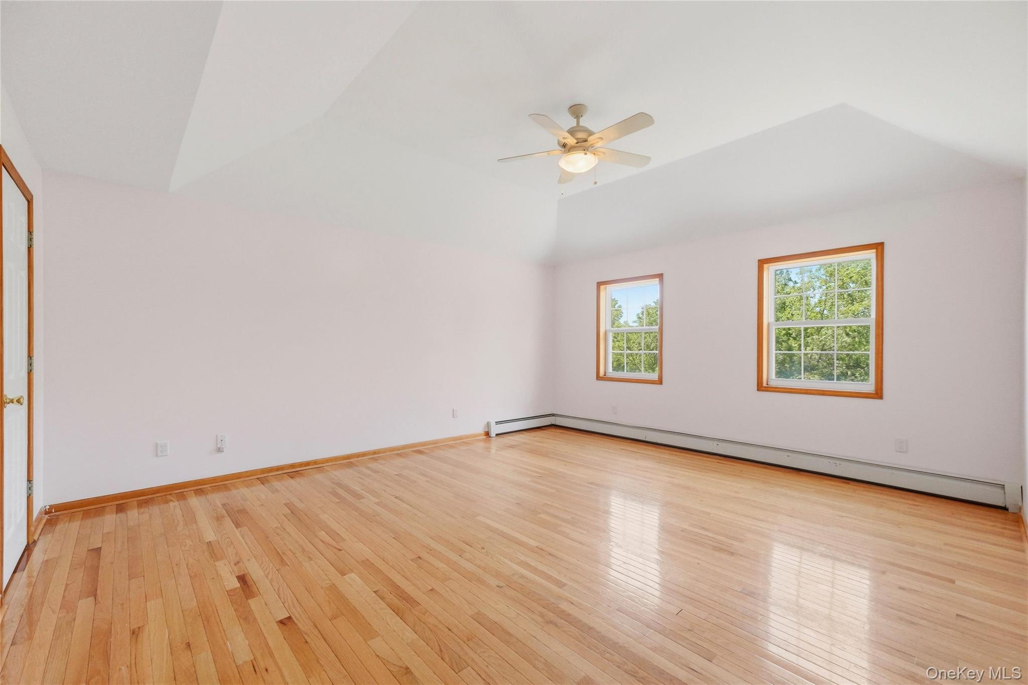 5 Horton Road Washingtonville, NY 10992 - Photo 18 of 42 an empty room with wooden floor and windows