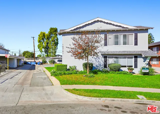 a front view of building with yard