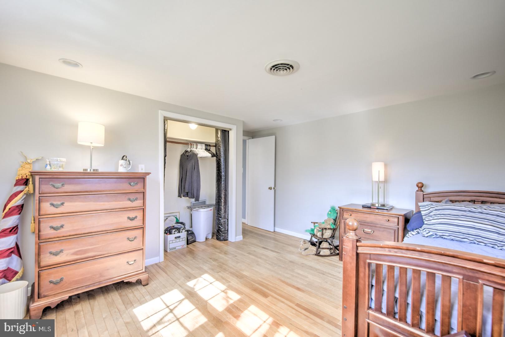 115 Diamond Rock Road Phoenixville, PA 19460 - Photo 27 of 33 a bedroom with a bed and furniture