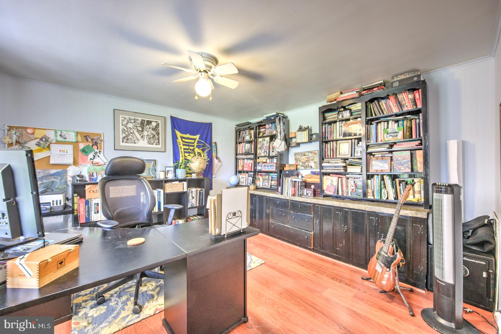 115 Diamond Rock Road Phoenixville, PA 19460 - Photo 5 of 33 a work room with furniture and wooden floor
