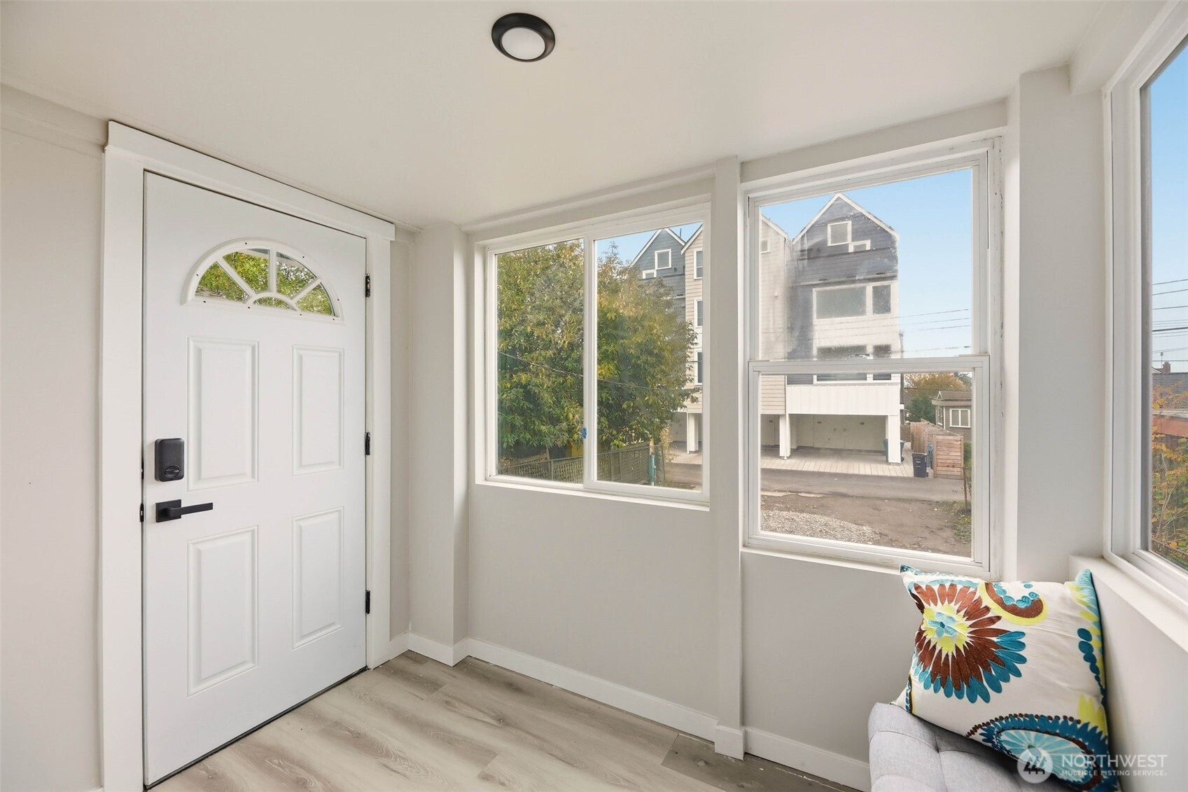 2813 15th Avenue South Seattle, WA 98144 - Photo 12 of 37 a view of an entryway with wooden floor and a window