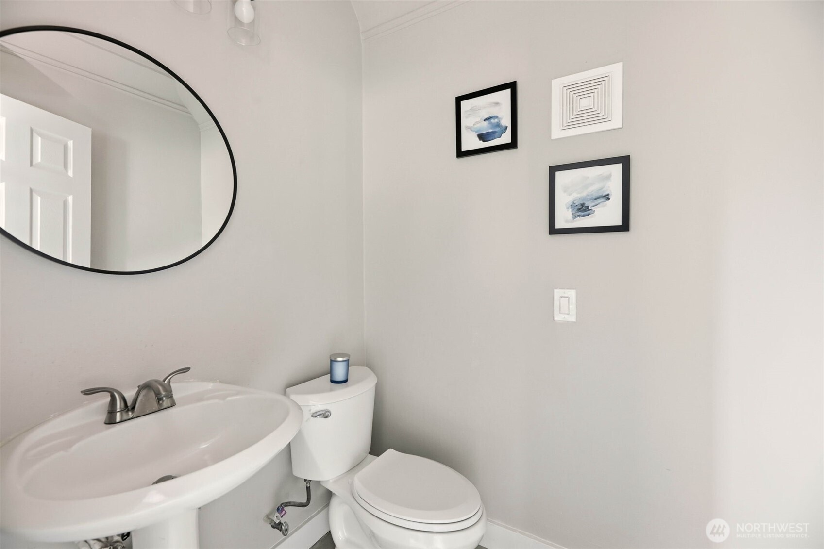 2813 15th Avenue South Seattle, WA 98144 - Photo 13 of 37 a white toilet sitting next to a bathroom sink