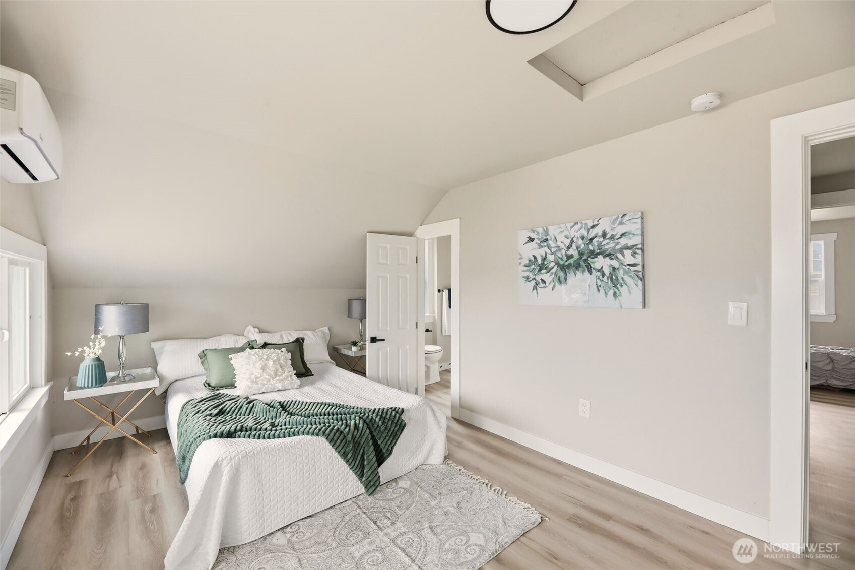 2813 15th Avenue South Seattle, WA 98144 - Photo 20 of 37 a bedroom with a large bed and a window