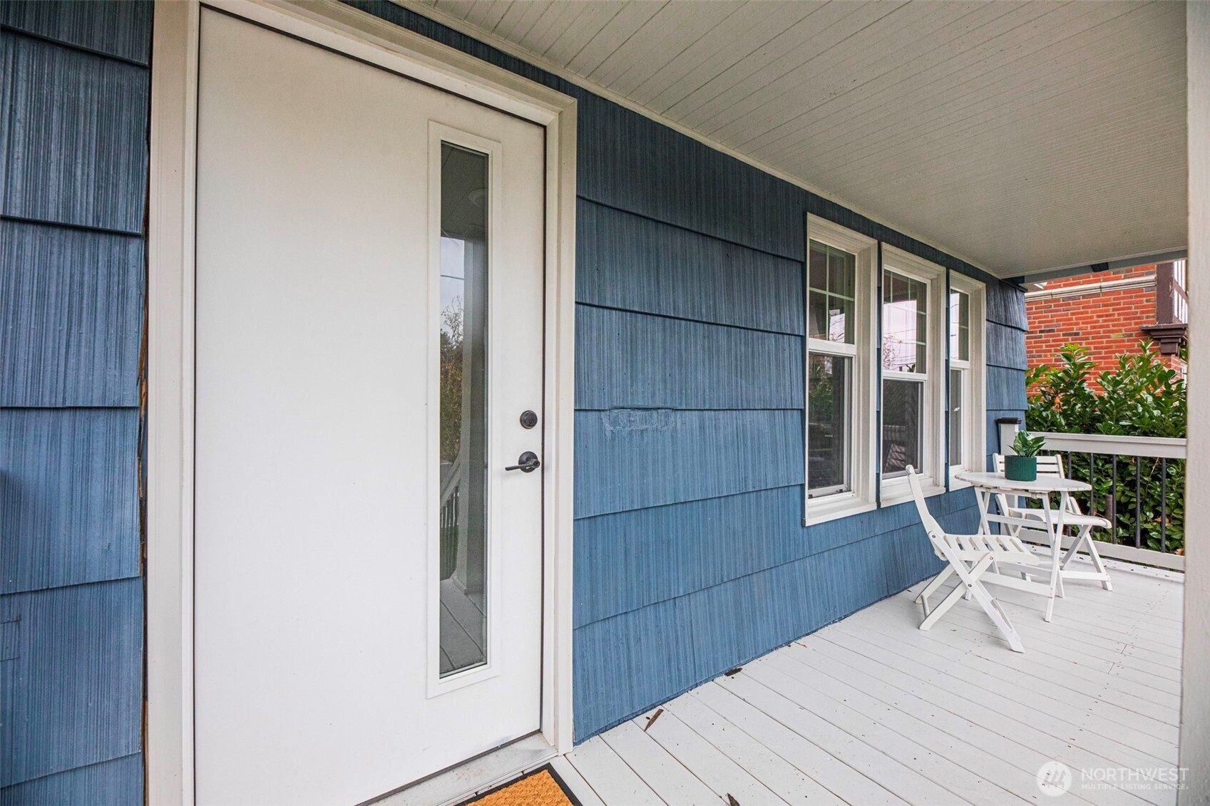 2813 15th Avenue South Seattle, WA 98144 - Photo 3 of 37 a balcony with table and chairs