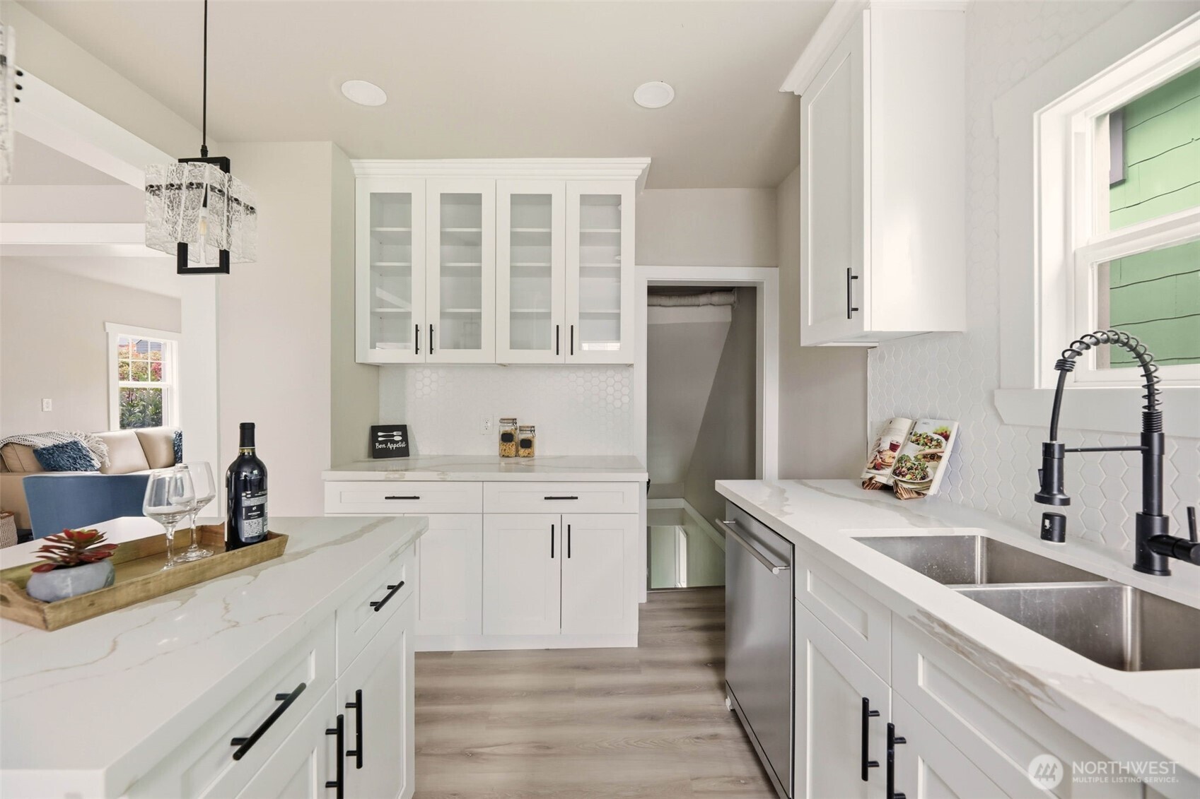 2813 15th Avenue South Seattle, WA 98144 - Photo 10 of 37 a kitchen with a sink cabinets and window