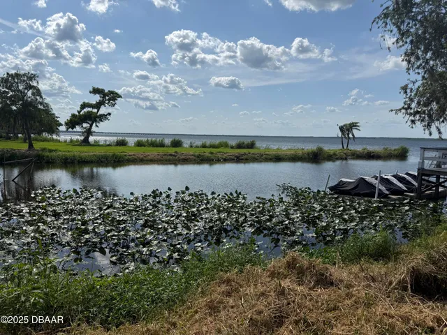 a view of a lake with a city