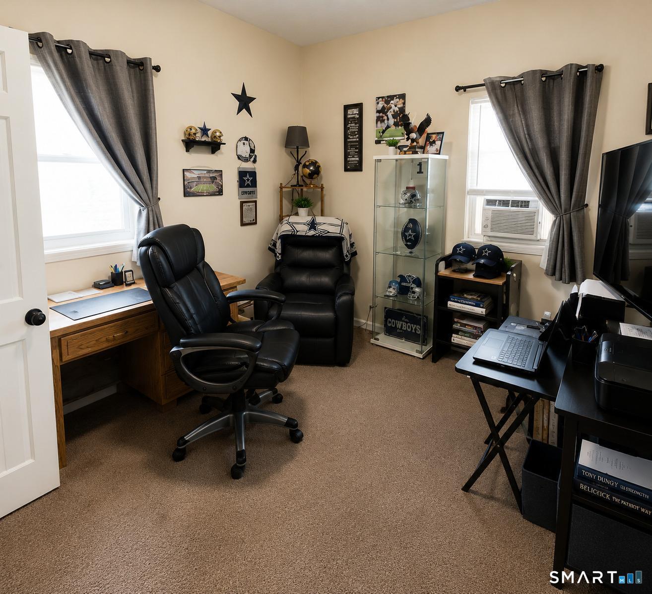 61 Bartlett Street Meriden, CT 06451 - Photo 16 of 30 a view of a workspace with furniture and a window