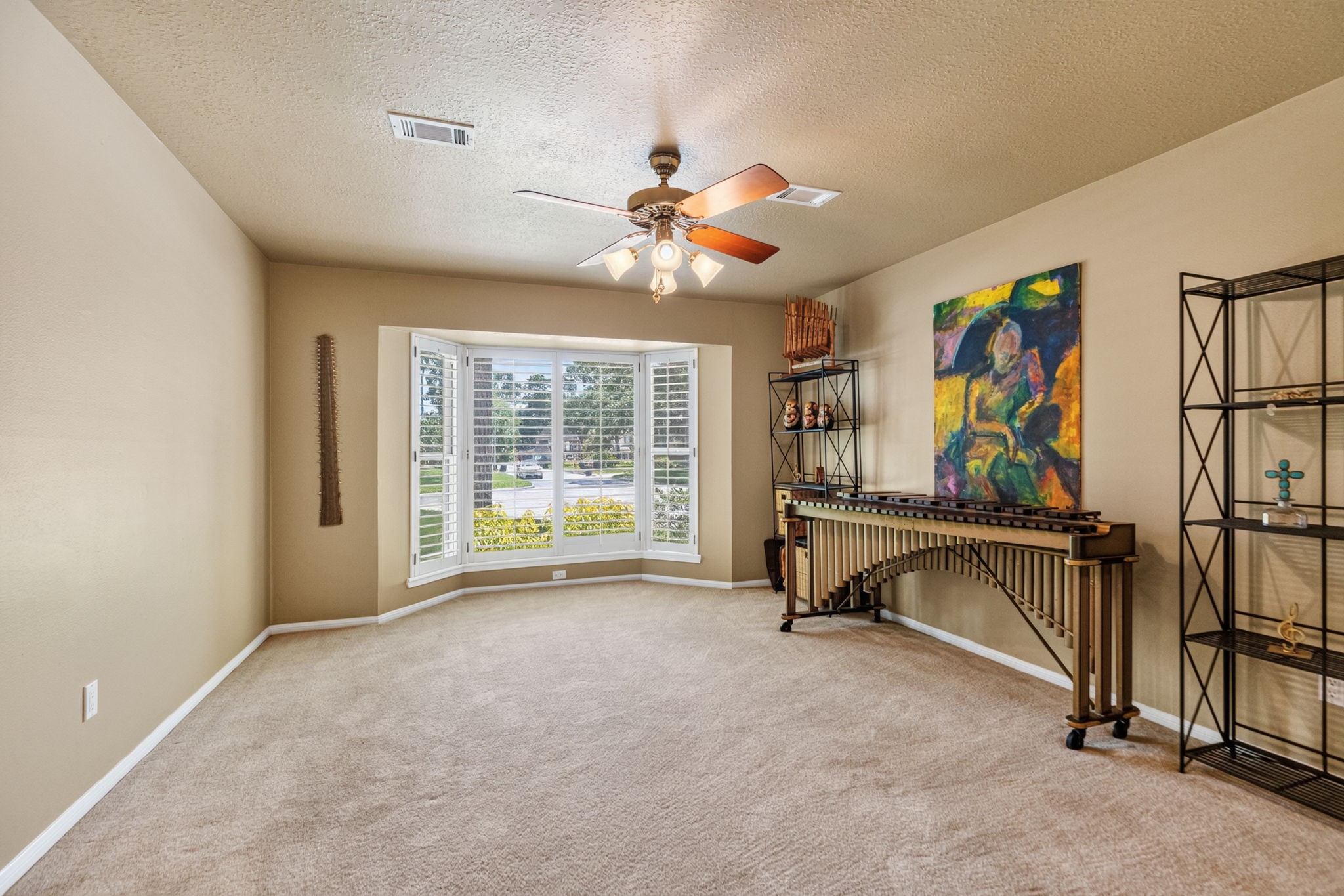 3414 Flaming Candle Drive Spring, TX 77388 - Photo 24 of 50 LIVING ROOM - This room is spacious and faces the front yard. The large bay window provides a beautiful view of the front yard and cul-de-sac. It has plantation shutters as well.