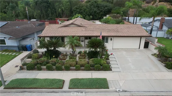 a view of a house with garden