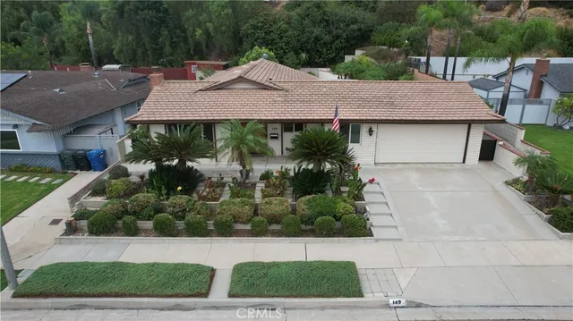 a view of a house with garden