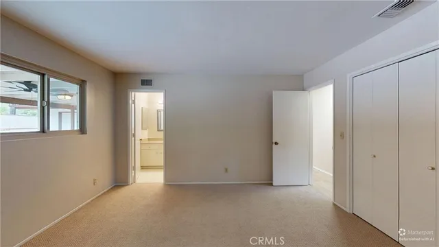 an empty room with windows