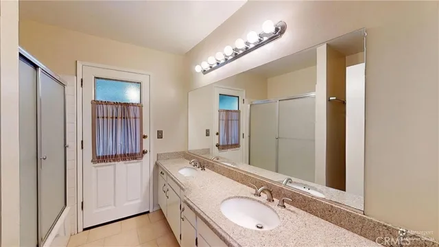 a view of hallway with washer and dryer
