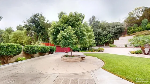 an aerial view of a house with a swimming pool