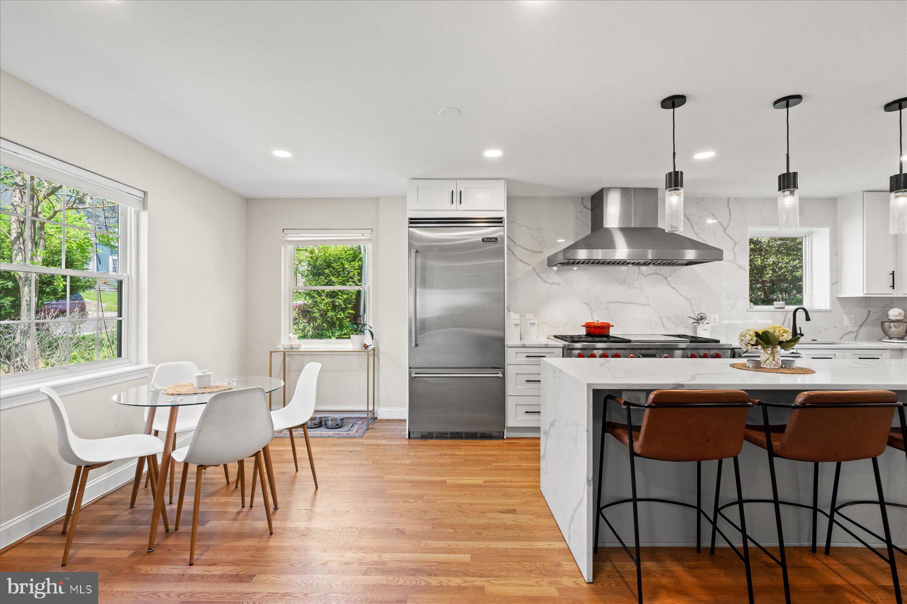 5612 Overlea Road Bethesda, MD 20816 - Photo 6 of 55 Plenty of seating with an eating area and island