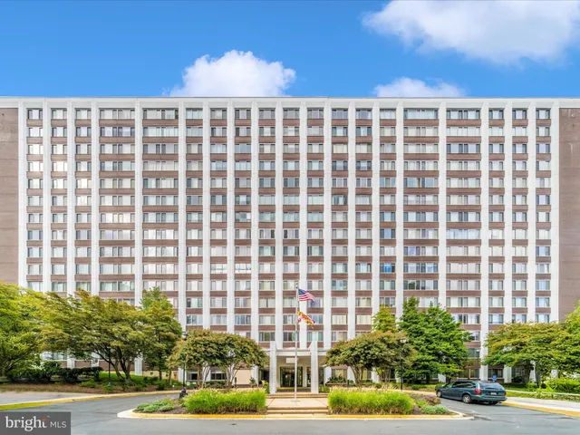 a view of a building with a street