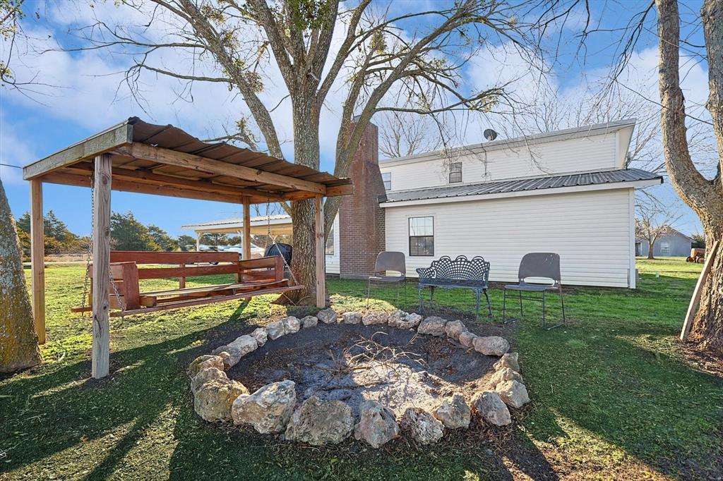 491 Emily Lane Van Alstyne, TX 75495 - Photo 21 of 21 a front view of a house with garden