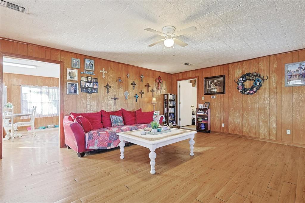 491 Emily Lane Van Alstyne, TX 75495 - Photo 5 of 21 a living room with furniture and a table