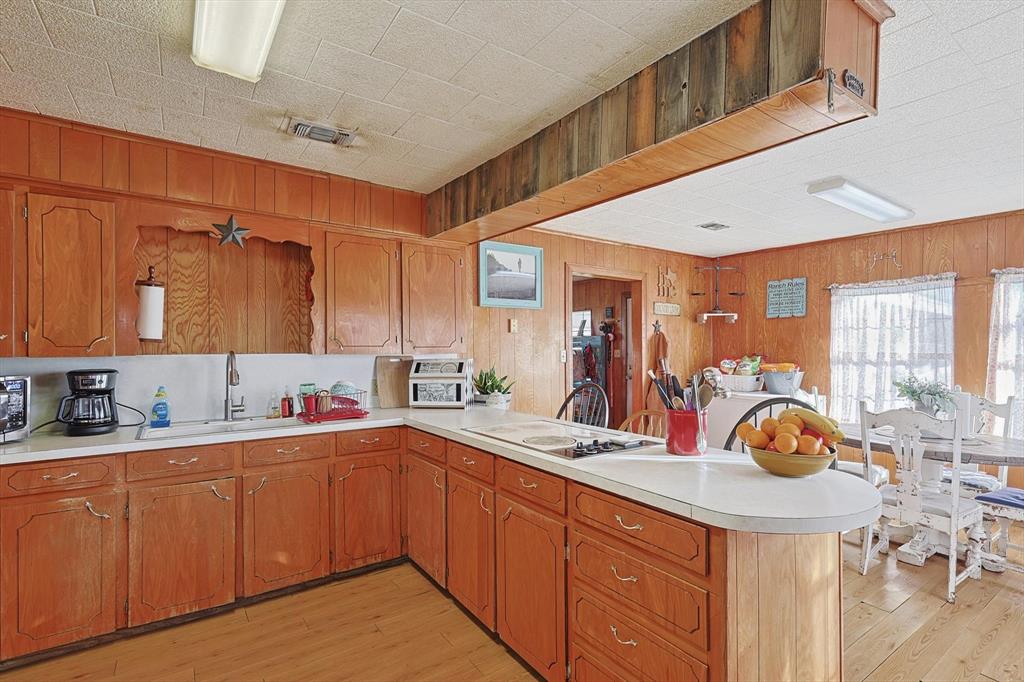491 Emily Lane Van Alstyne, TX 75495 - Photo 8 of 21 a very nice looking kitchen with a large window