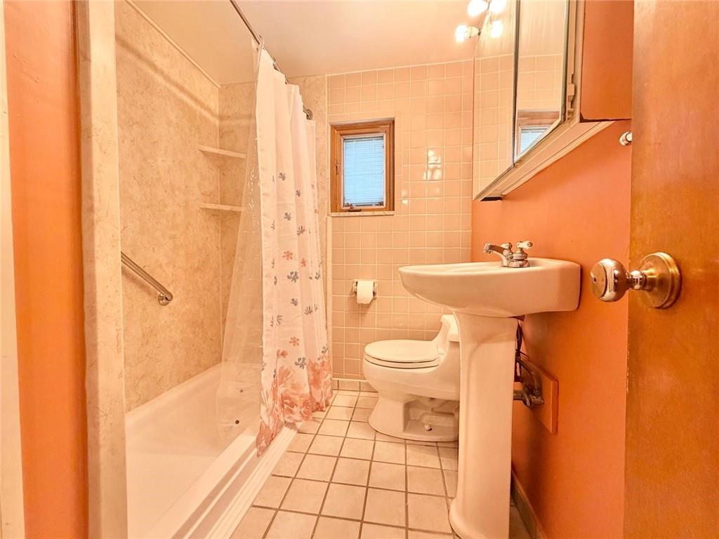 4289 Glen Lytle Road Pittsburgh, PA 15217 - Photo 18 of 46 Upper Level Full Bathroom with a Walk-in Shower.