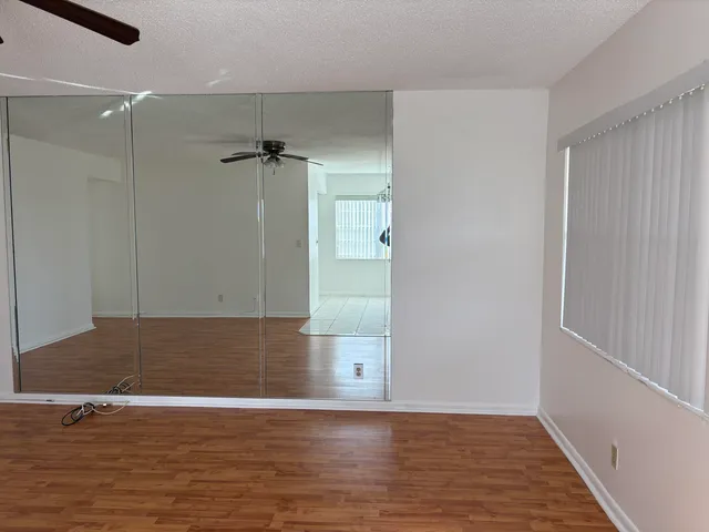 a view of swimming pool from a balcony