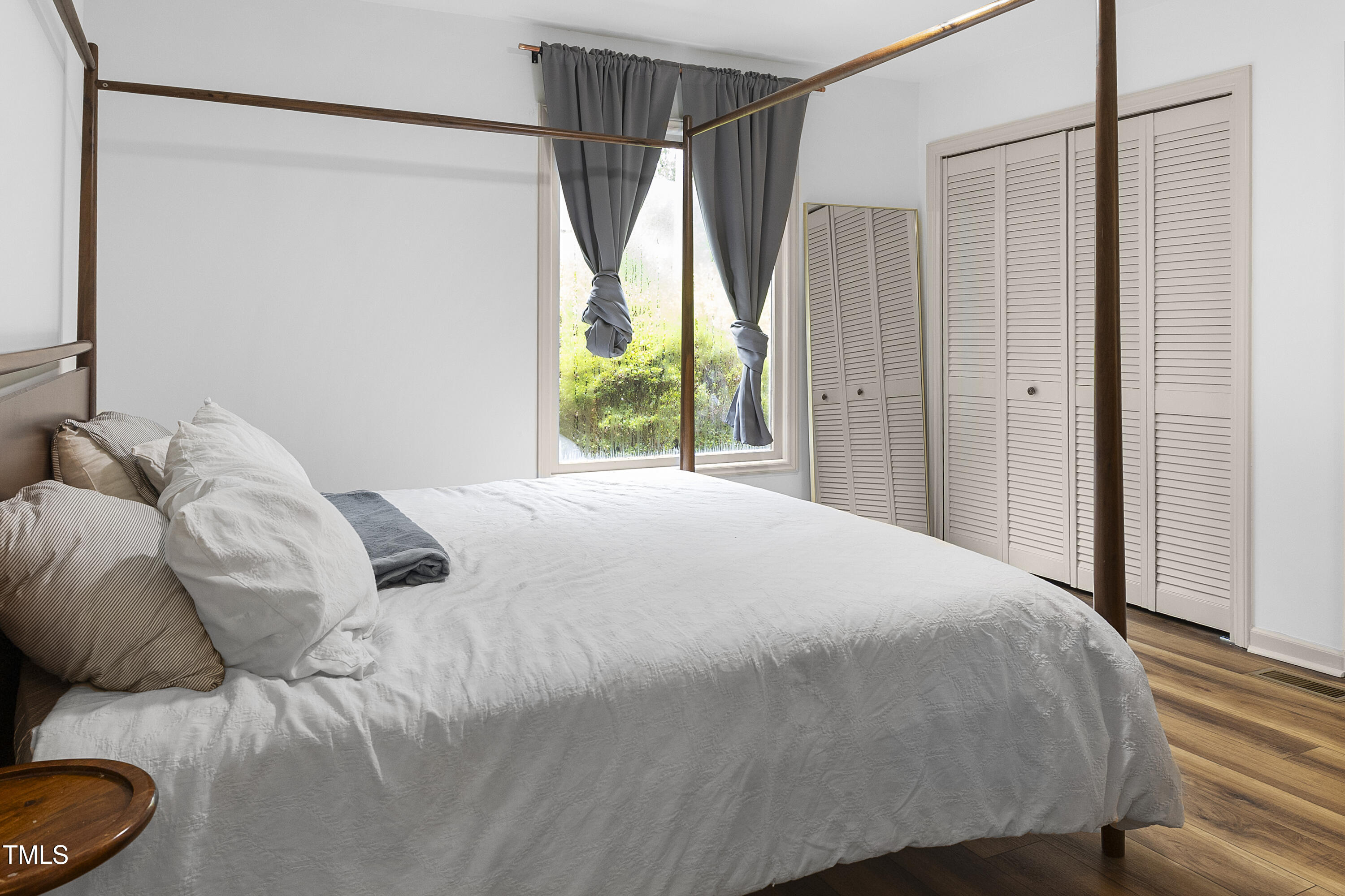 73 Hilltop Road Sanford, NC 27330 - Photo 18 of 54 a bedroom with a bed window and a shower