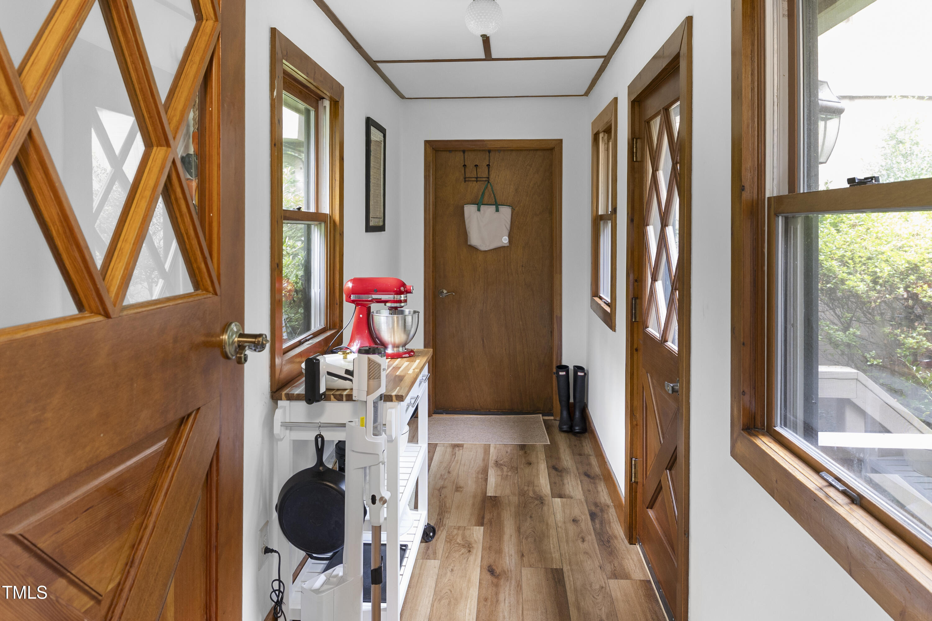 73 Hilltop Road Sanford, NC 27330 - Photo 23 of 54 a view of an entryway with wooden floor and windows