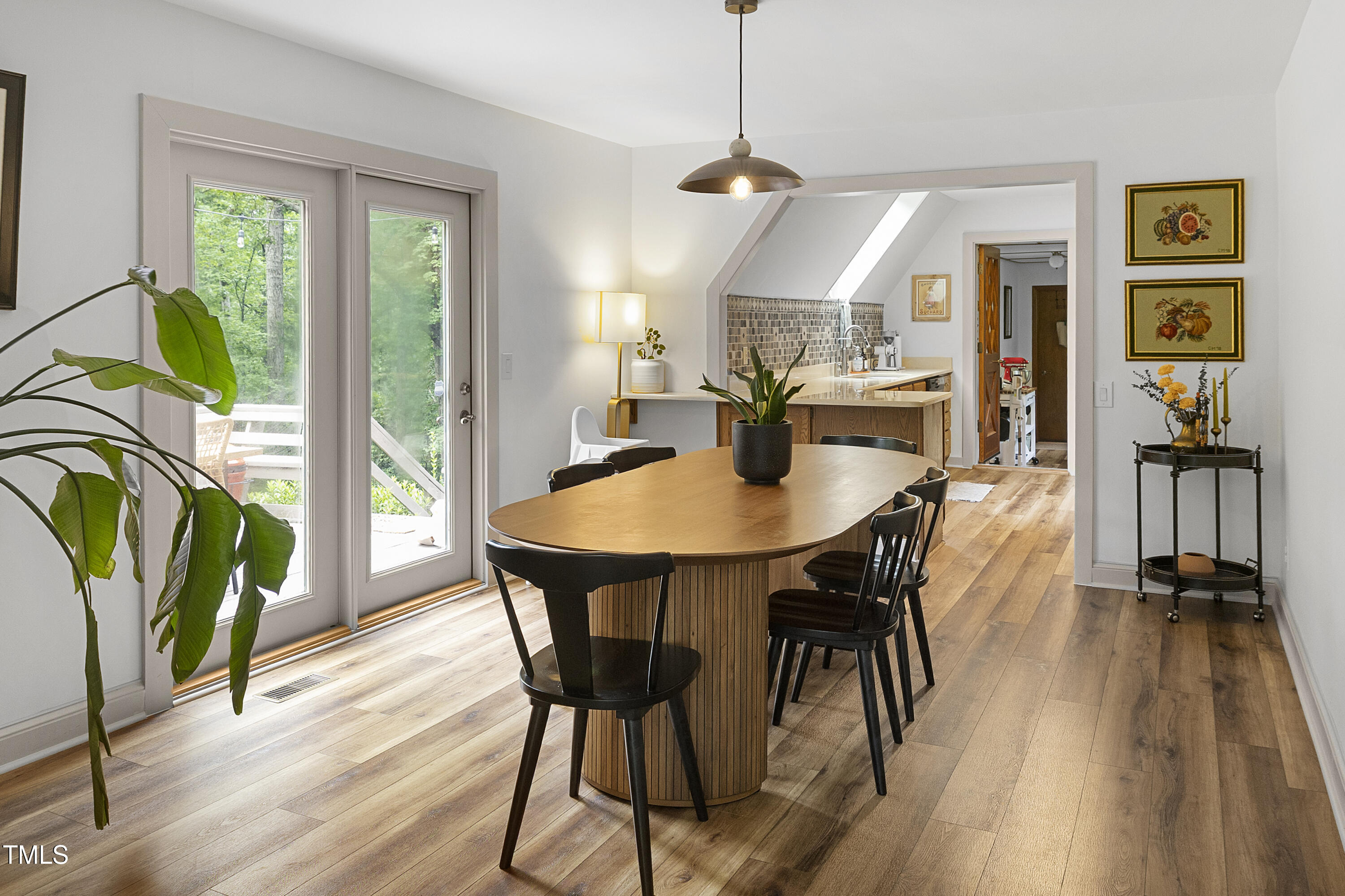 73 Hilltop Road Sanford, NC 27330 - Photo 24 of 54 a dining room with furniture window wooden floor