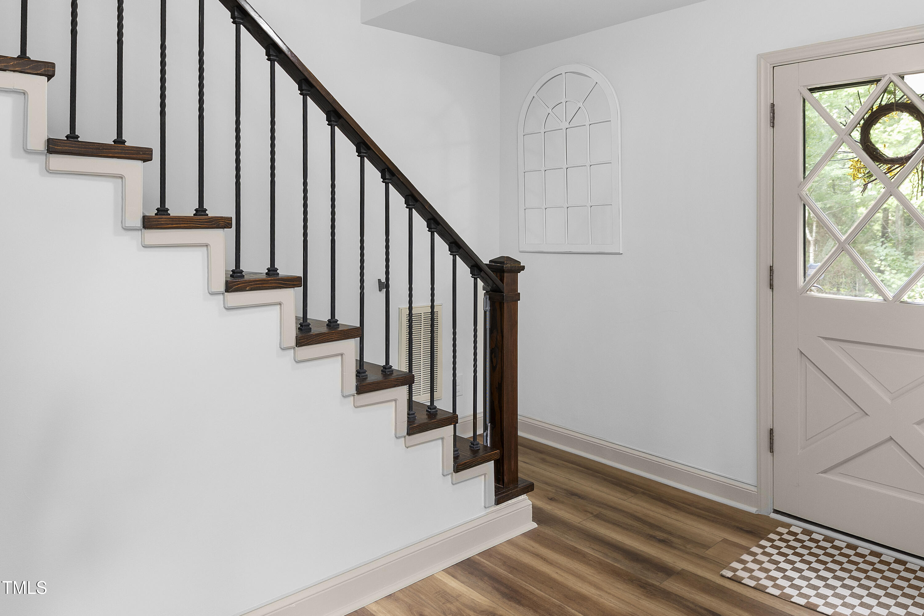 73 Hilltop Road Sanford, NC 27330 - Photo 27 of 54 a view of entryway and hall with wooden floor