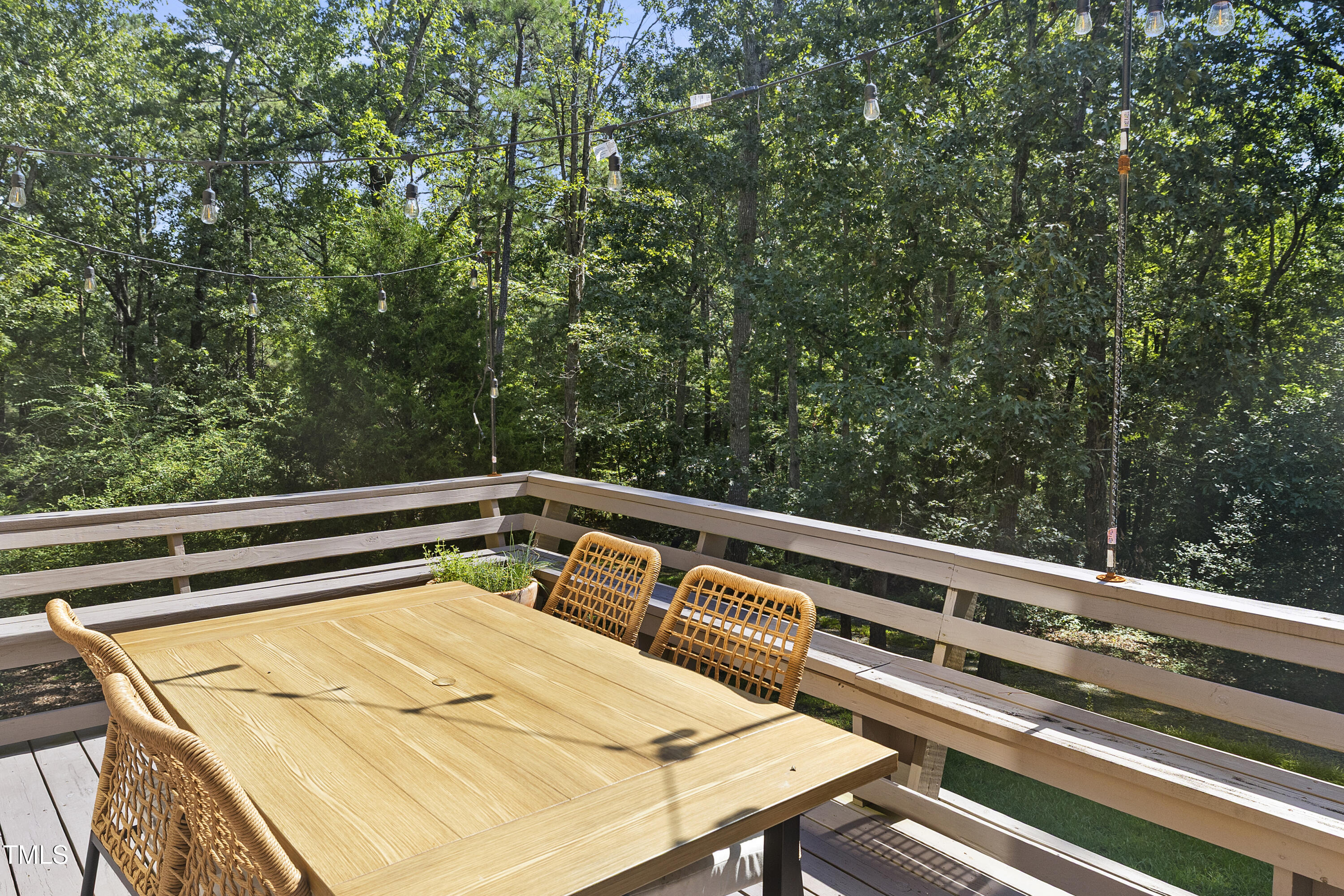 73 Hilltop Road Sanford, NC 27330 - Photo 41 of 54 a view of balcony with wooden floor and fence