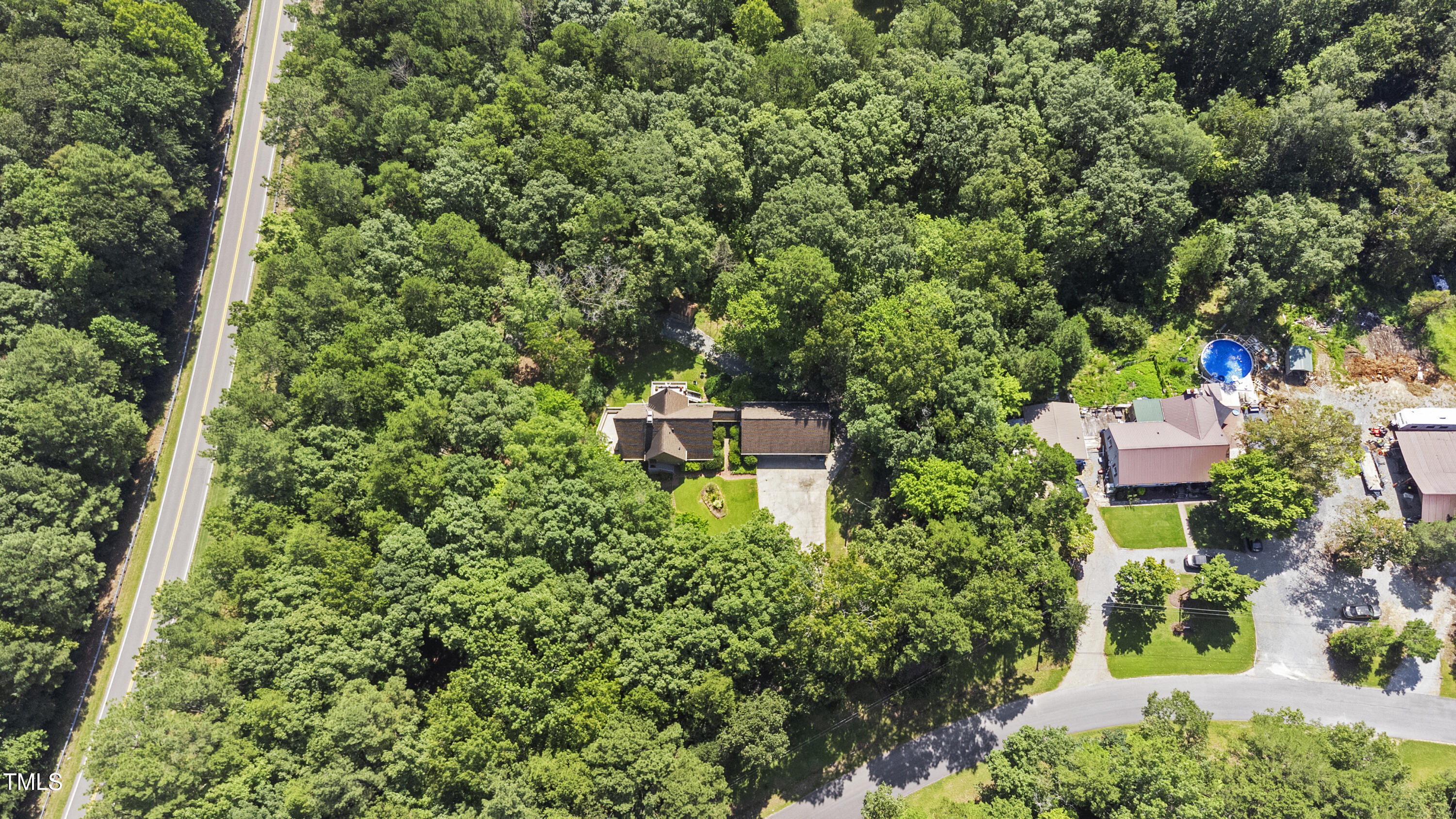 73 Hilltop Road Sanford, NC 27330 - Photo 46 of 54 an aerial view of a house with a yard