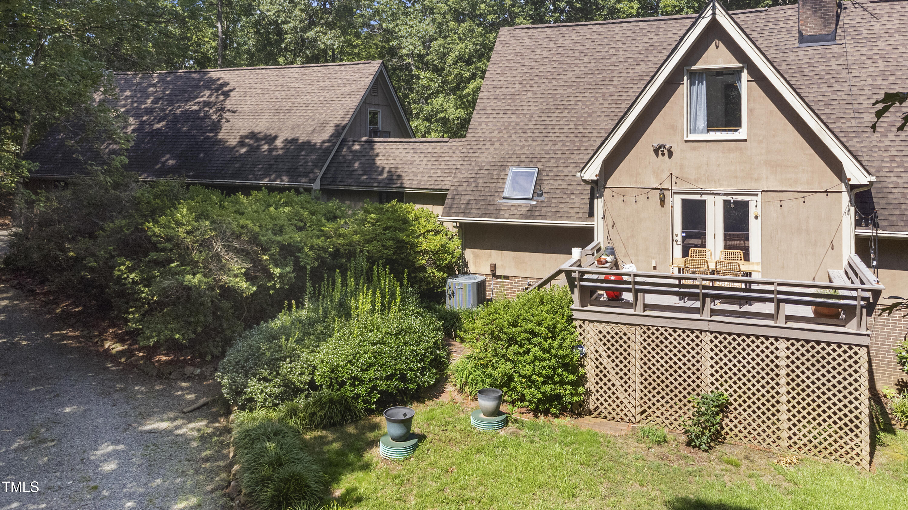 73 Hilltop Road Sanford, NC 27330 - Photo 50 of 54 a view of a house with a yard