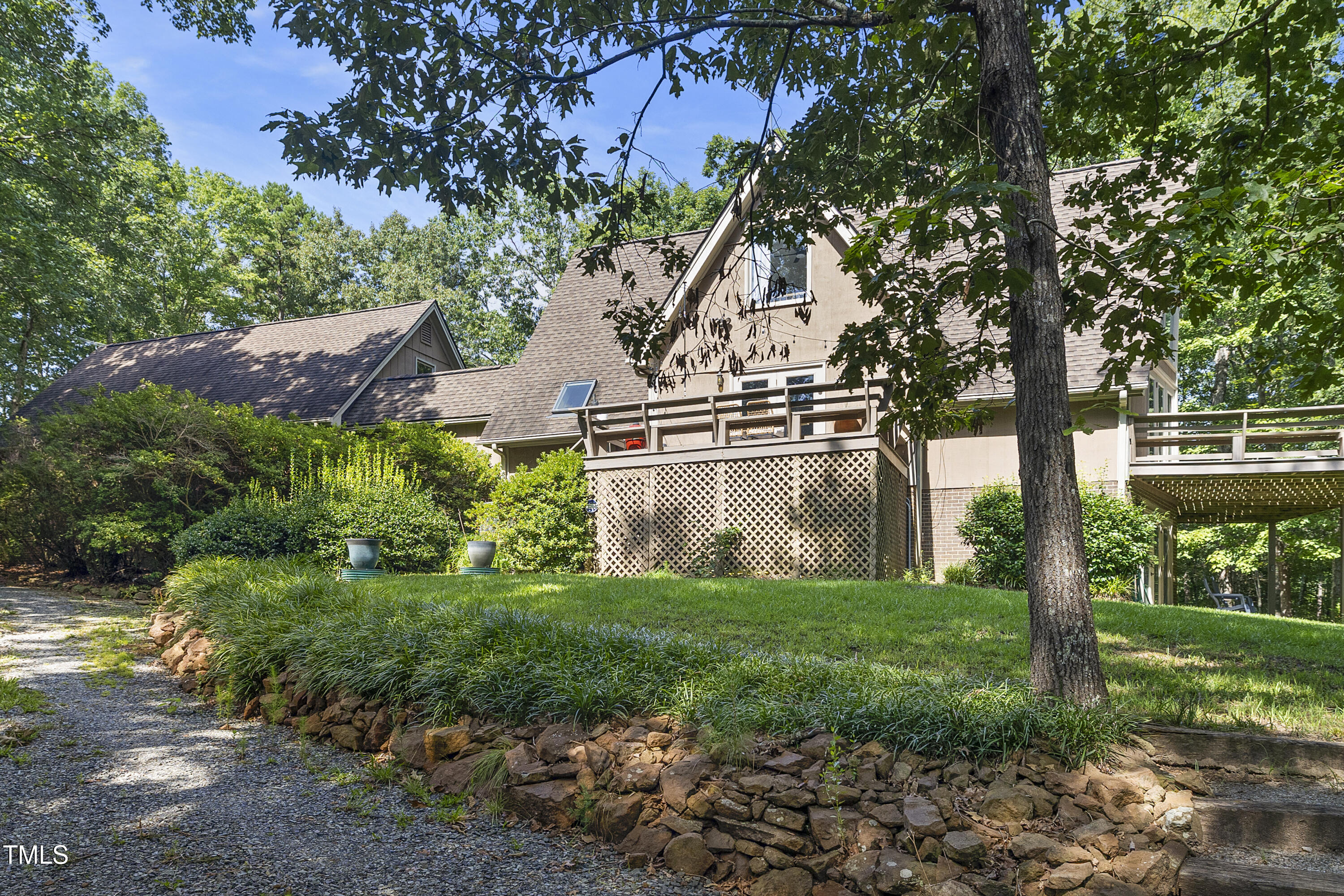 73 Hilltop Road Sanford, NC 27330 - Photo 4 of 54 a view of a house with a yard