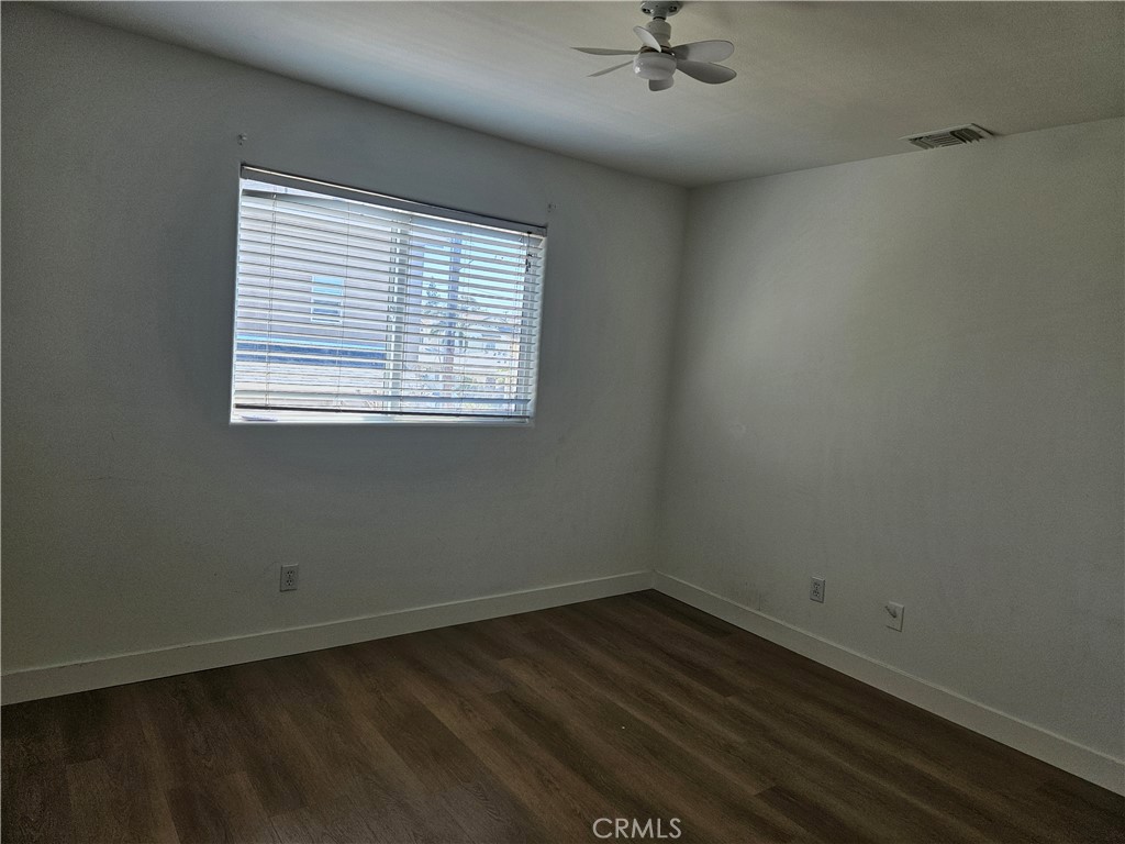 8598 Belmont Street Cypress, CA 90630 - Photo 19 of 23 an empty room with a window