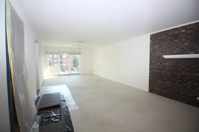 a view of livingroom with furniture and window