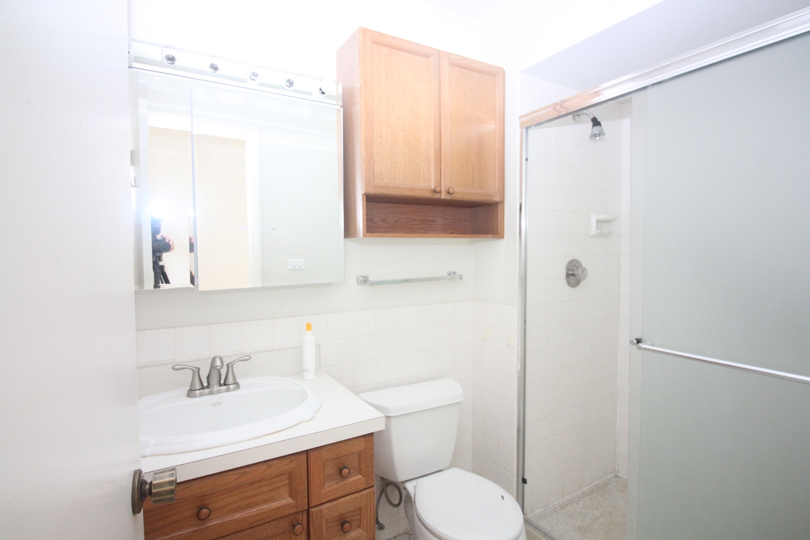 475 Shenstone Road, Unit 303 Riverside, IL 60546 - Photo 10 of 12 a bathroom with a sink a toilet and shower